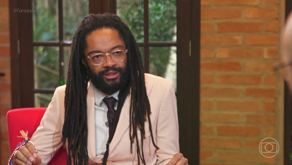 Fióti fala sobre briga com Emicida, nega saques indevidos e revela crise antiga entre irmãos: ‘Dinheiro nunca foi o que me mobilizou’